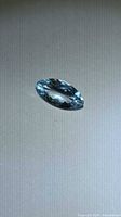 Top view of loose marquise aquamarine gemstone
