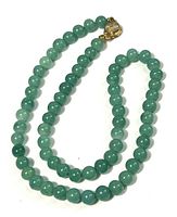 Full view of the aventurine bead necklace arranged to show beads and clasp