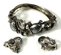 Bracelet and both earrings front view