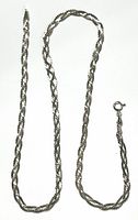 Full view of sterling silver braided rope chain necklace showing length and clasp