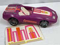 Full view of toy car with decal sheet