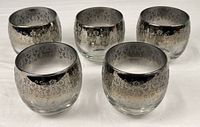 Group view of five silver fade roly-poly glasses