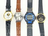 All four wristwatches laid side by side showing dials and straps