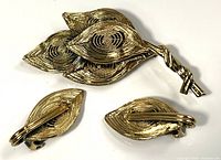 Full view of brooch and both earrings