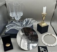 Group shot showing all nine items in lot