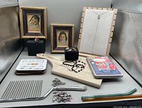 All items overview including cake breaker, framed prints, ring, bracelets, board, straws, charms