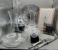 Group shot showing tray, decanters, frame, necklaces, carving set, trinket box