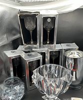Front view of boxed goblets, lucite bowl, ice bucket, jar