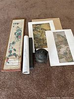 Group overview showing framed painting, rolled scroll, two mounted prints, brass censer and scroll box