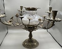 Full view of brass candelabra epergne with glass bowl