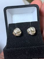 Pair of sterling silver love knot earrings in presentation box