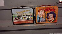 Front view of both lunch boxes standing upright