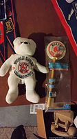 Plush bear and packaged toothbrush