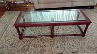 Top view showing entire rectangular table with two glass panels and faux bamboo frame