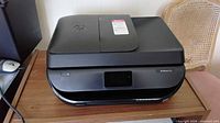 HP OfficeJet 5255 printer closed on tabletop