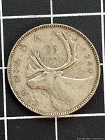 Reverse showing caribou, date 1949, denomination 25 cents