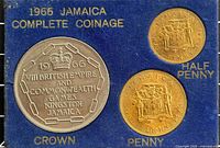 Obverse view of three 1966 Jamaican coins in presentation holder