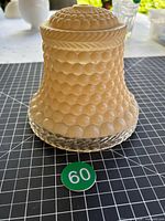 Side profile of frosted ivory hobnail milk glass lamp shade with rope edge