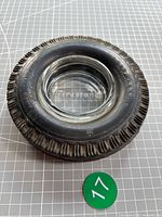 Top view of rubber tire ashtray with glass insert