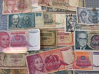 Spread of all banknotes showing denominations and condition