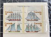 Front of packaged corner block sheet showing four different 12¢ Sailing Vessels stamps