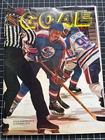 Front cover showing Dale Hawerchuk and Wayne Gretzky action photo
