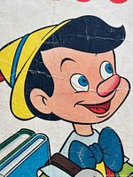 Close-up of Pinocchio’s head from comic cover showing art detail and surface creasing