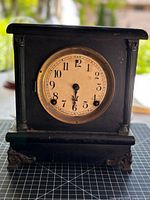 Front view of Sessions mantel clock showing case, dial and overall condition