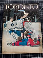 Front cover showing action photo and title TORONTO with $1 price