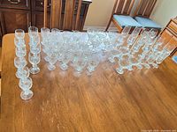 Full set of crystal stemware arranged on table