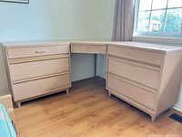 Full L-shaped desk assembled showing both pedestal cabinets and corner section
