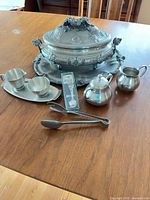 Group shot of all pewter pieces on table
