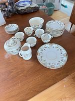 Full set laid out on table showing quantity and pattern