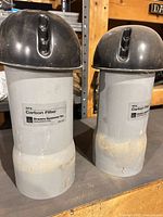 Front view of both CF4 carbon filters showing labels and overall condition