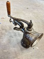 Full view of grinder showing handle, clamp, overall wear