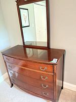 Front view of dresser with attached mirror
