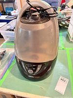 Front view of Sunbeam humidifier with attached cord and control panel