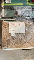 Wrapped hardware pack and label