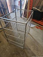 Full view of silver wire basket storage unit