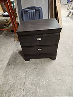 Front view showing nightstand and drawers closed