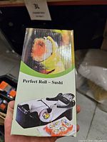 Front view of boxed Perfect Roll sushi roller