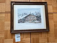 Framed watercolor artwork, full view with size reference tag
