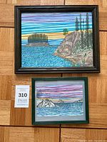 Both framed artworks front view