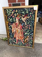 Full view of framed needlepoint showing entire design and frame