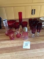 Entire assortment of ruby red glassware on countertop