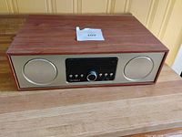 Front view of Victrola stereo showing speaker grilles and control panel