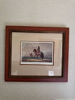 Front view of framed print showing image, mat, frame, glazing