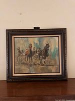 Full view of framed oil painting showing subject and frame