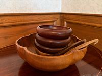 stacked set showing large bowl, four small bowls, servers