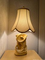 full view lit showing ceramic base and shade